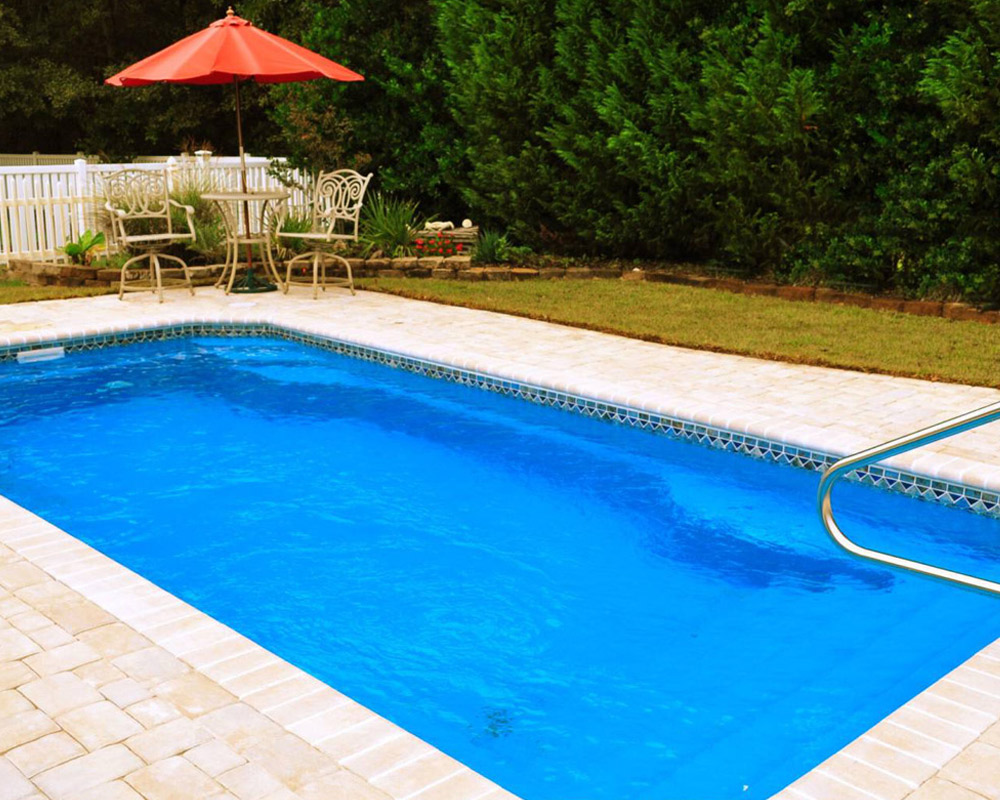 outdoor living ideas with Grande fiberglass pool New Brockton AL